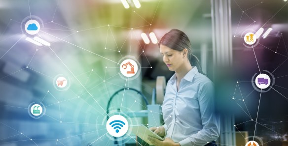 industry and Internet of Things concept. woman working in factory and wireless communication network. Industry4.0.